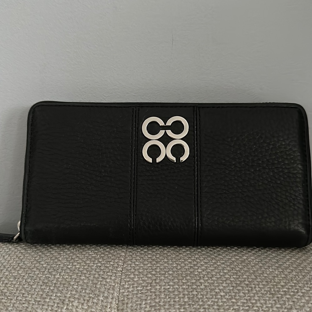 Coach leather wallet with zipper around closure